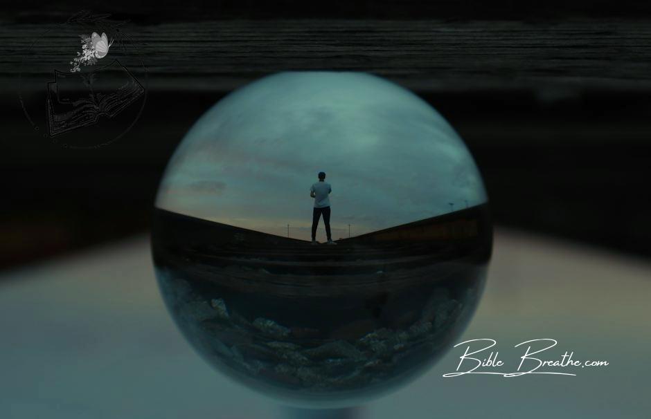 Round Glass Ball Reflecting Man Standing