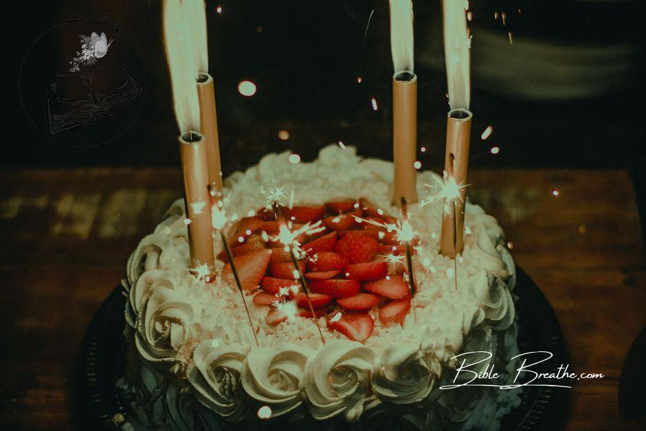 Lighted Candles on an Elegant Looking Cake 