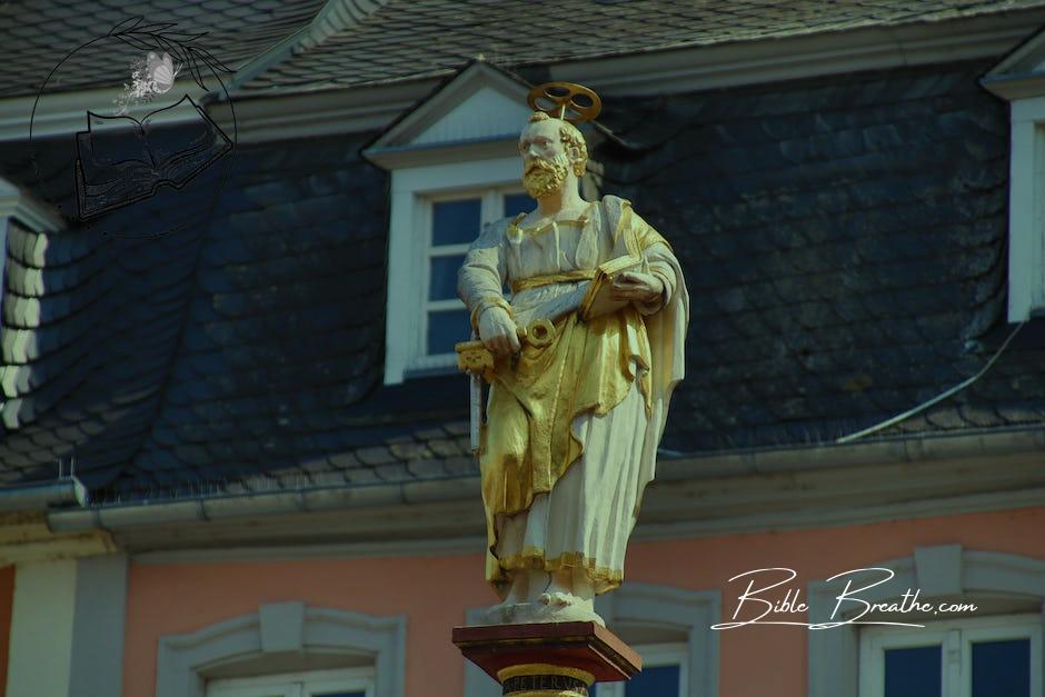 A Gold Statue on Near the Building