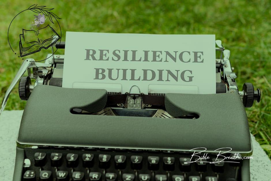 A typewriter with a paper that says resilience building