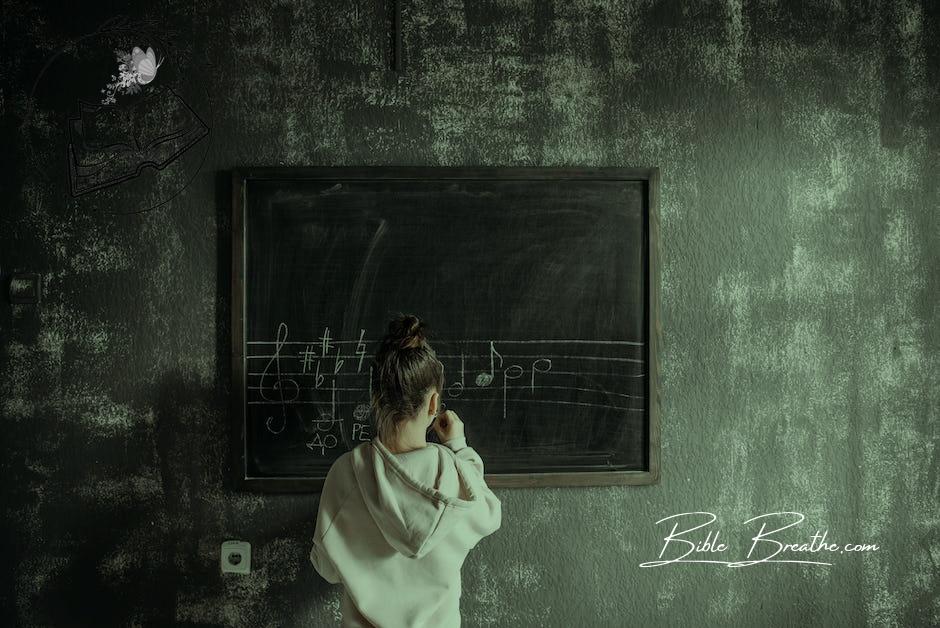 Girl Writing on a Chalkboard