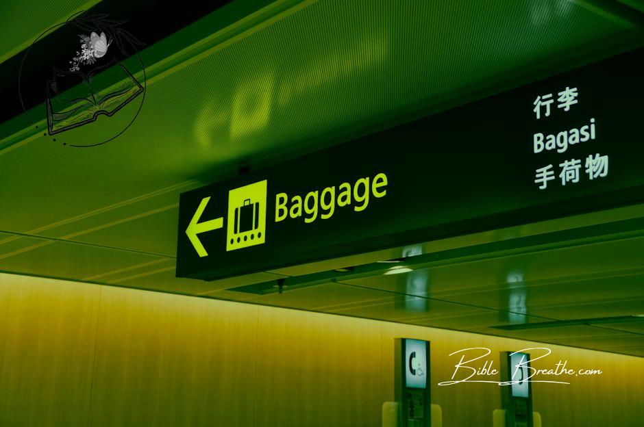 Close-up Photo of Baggage Sign