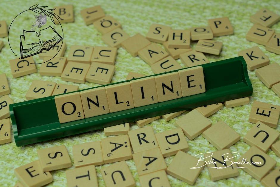 The word online is spelled out with scrabble tiles