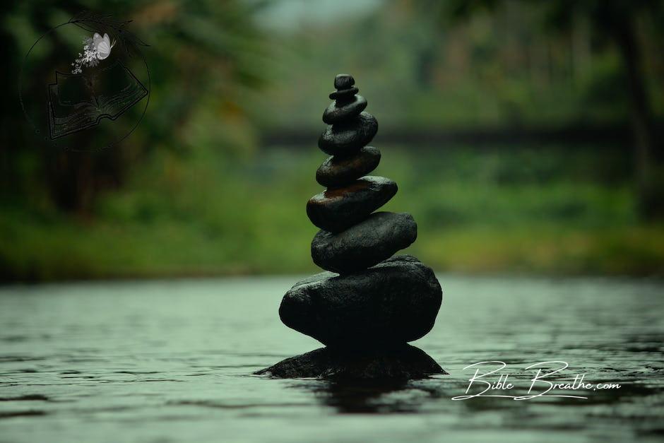 Black Stackable Stone Decor at the Body of Water