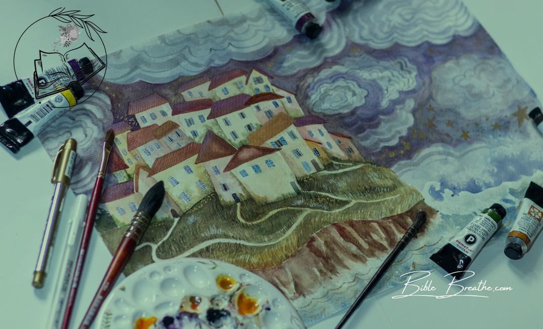 a painting of a village with a palette and paintbrushes