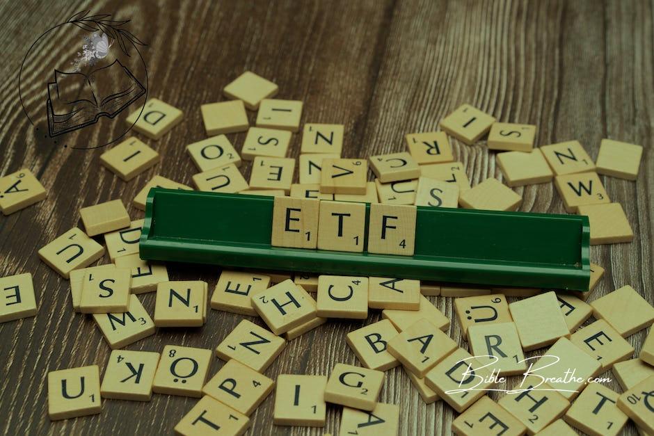 The word etf on a wooden board with scrabble tiles