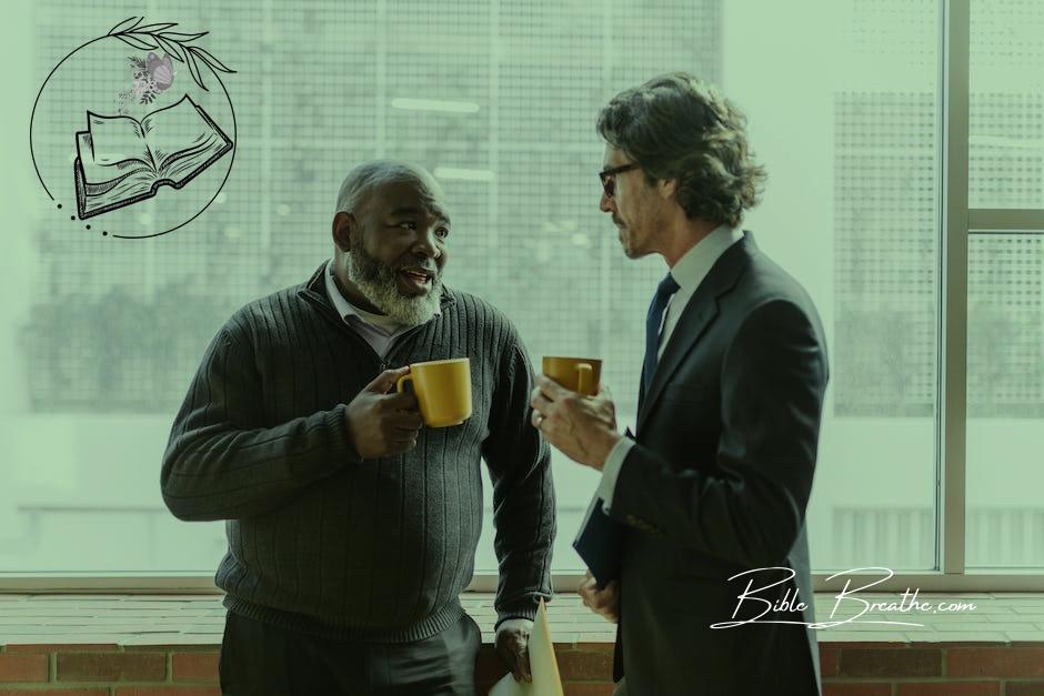 Businessmen Holding Coffee while Having Conversation