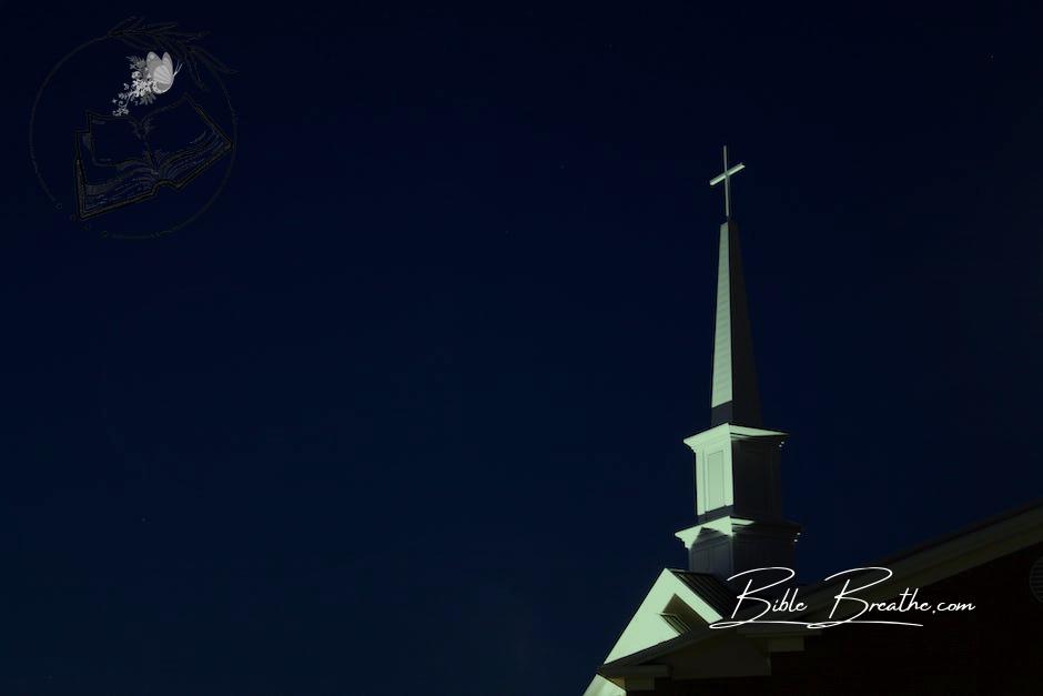 Low Angle View of Cross Against Sky at Night