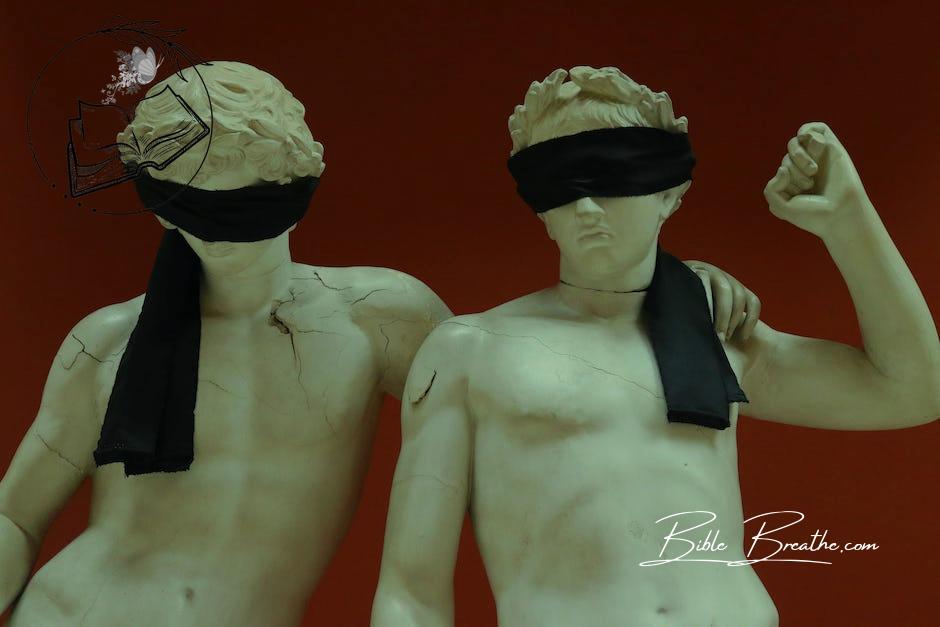 Statues Blindfolded With Black Textile