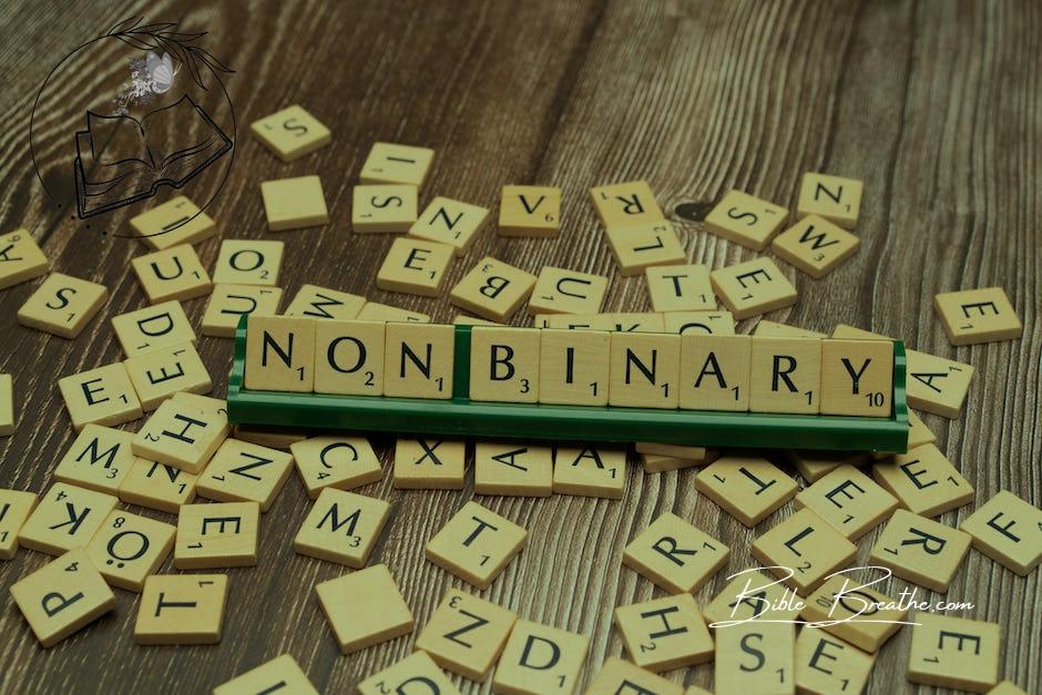 The word non - binary is spelled out with scrabble tiles