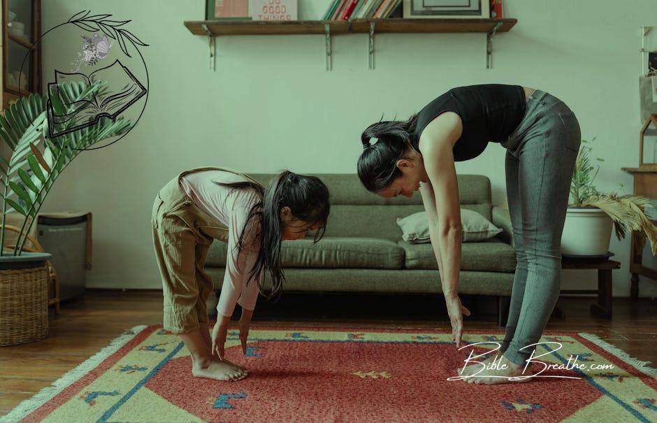 Photo of Woman and Girl Stretching Their Body