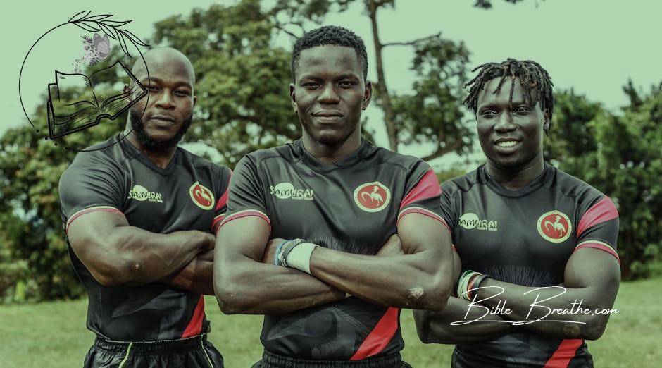 Athletes in Black Uniform Smiling at the Camera