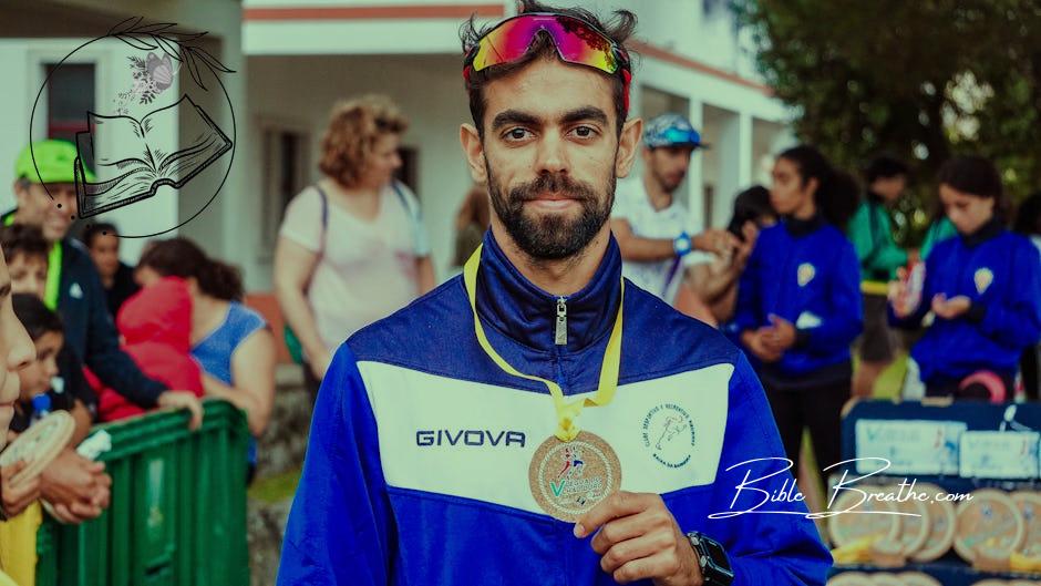 Photo of Man Showing His Medal