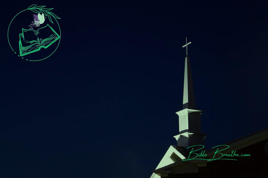 Low Angle View of Cross Against Sky at Night